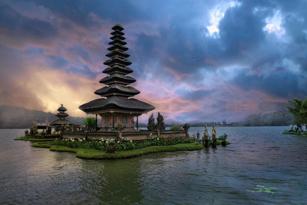 Ulun Danu Bratan Temple in Bali, Indonesia, beautifully reflected on the lake at twilight.