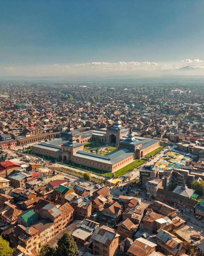 Captivating aerial view of Jamia Masjid amidst the bustling cityscape of Srinagar, Kashmir.